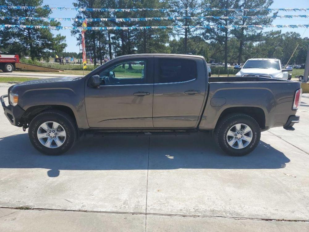 2017 Brown GMC CANYON SLE (1GTG6CEN5H1) with an 3.6L engine, Automatic transmission, located at 3553 US Hwy 190 W., Livingston, TX, 77351, (936) 967-8141, 30.812162, -95.077309 - Photo #1