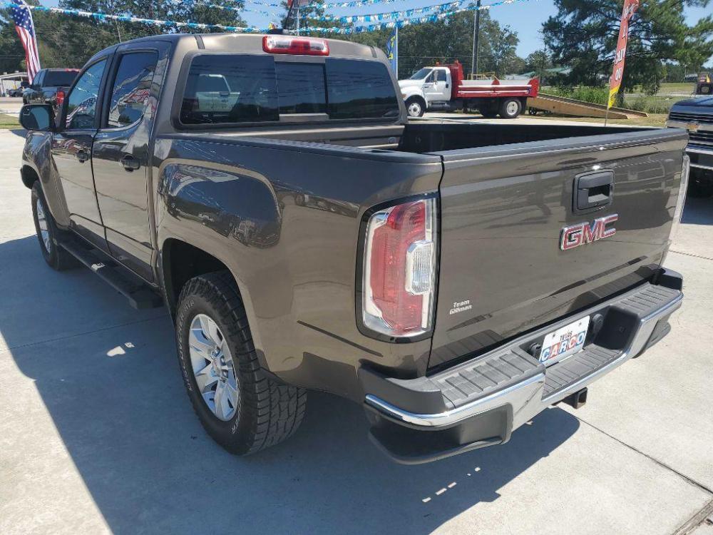 2017 Brown GMC CANYON SLE (1GTG6CEN5H1) with an 3.6L engine, Automatic transmission, located at 3553 US Hwy 190 W., Livingston, TX, 77351, (936) 967-8141, 30.812162, -95.077309 - Photo #2