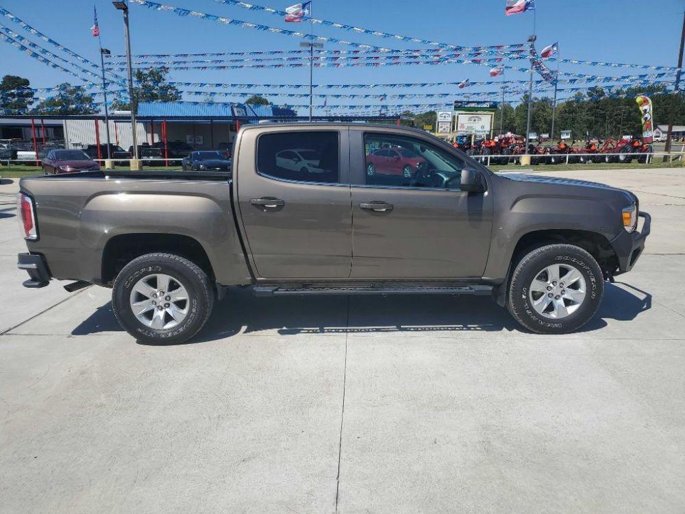 2017 Brown GMC CANYON SLE (1GTG6CEN5H1) with an 3.6L engine, Automatic transmission, located at 3553 US Hwy 190 W., Livingston, TX, 77351, (936) 967-8141, 30.812162, -95.077309 - Photo #6
