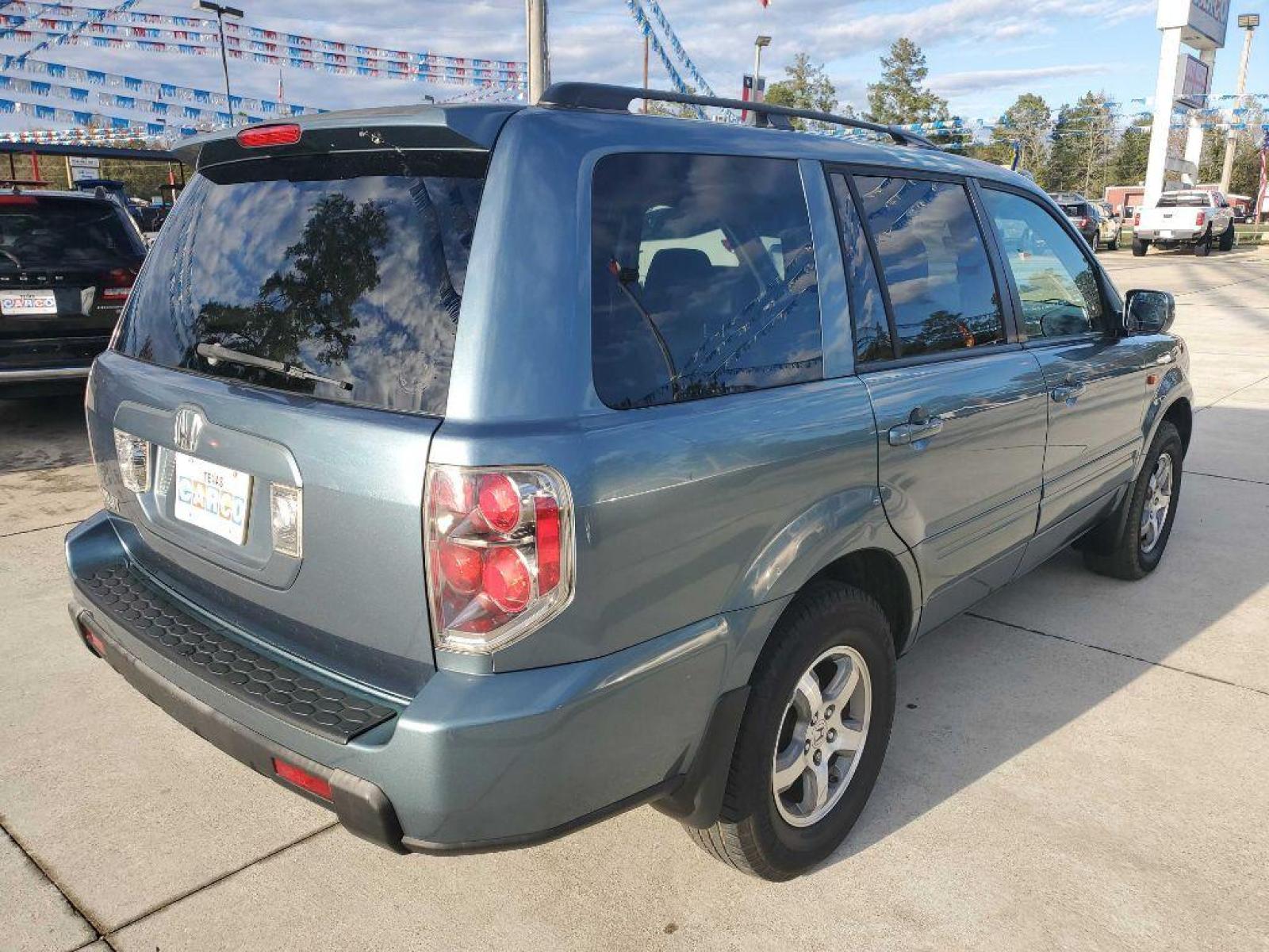 2007 Blue HONDA PILOT EXL (5FNYF28627B) with an 3.5L engine, Automatic transmission, located at 3553 US Hwy 190 W., Livingston, TX, 77351, (936) 967-8141, 30.812162, -95.077309 - Great chance to get a good deal on a 3 row 2007 Honda Pilot. This EXL Edition features 3 rows of leather, folding back row, rear DVD player, sunroof, heated seats and more! Come by today to make it yours! - Photo #0
