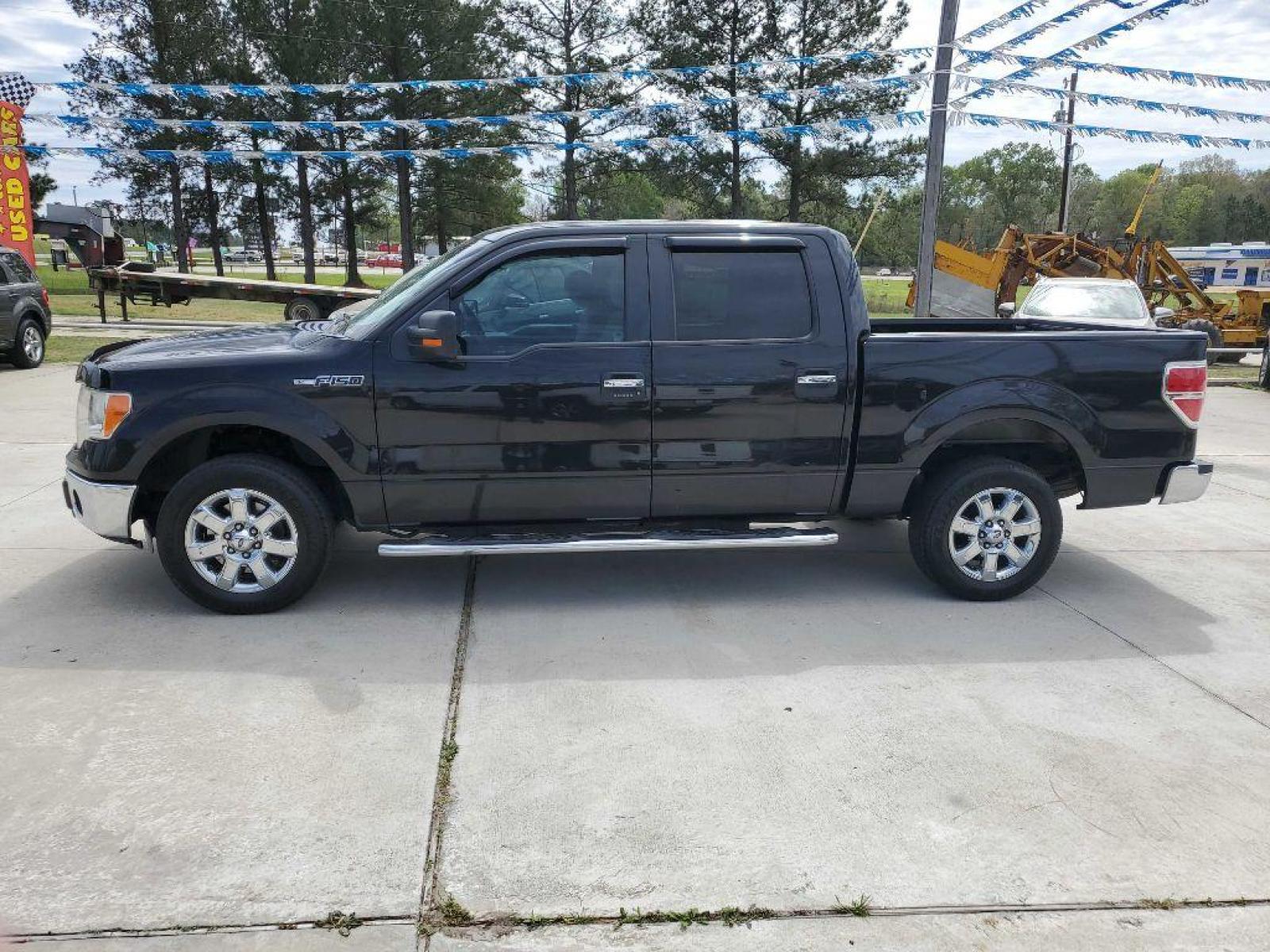 2014 Black FORD F150 SUPERCREW (1FTFW1CF0EK) with an 5.0L engine, Automatic transmission, located at 3553 US Hwy 190 W., Livingston, TX, 77351, (936) 967-8141, 30.812162, -95.077309 - Photo #1
