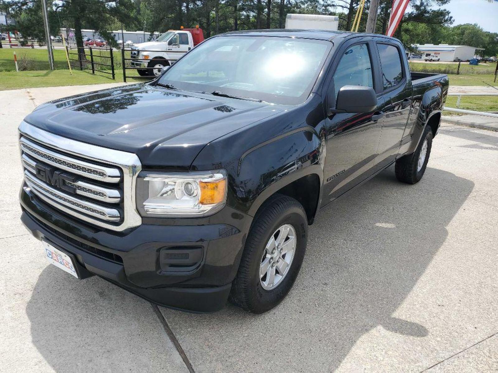 2018 Black GMC CANYON (1GTG5BEN7J1) with an 3.6L engine, Automatic transmission, located at 3553 US Hwy 190 W., Livingston, TX, 77351, (936) 967-8141, 30.812162, -95.077309 - Photo #0