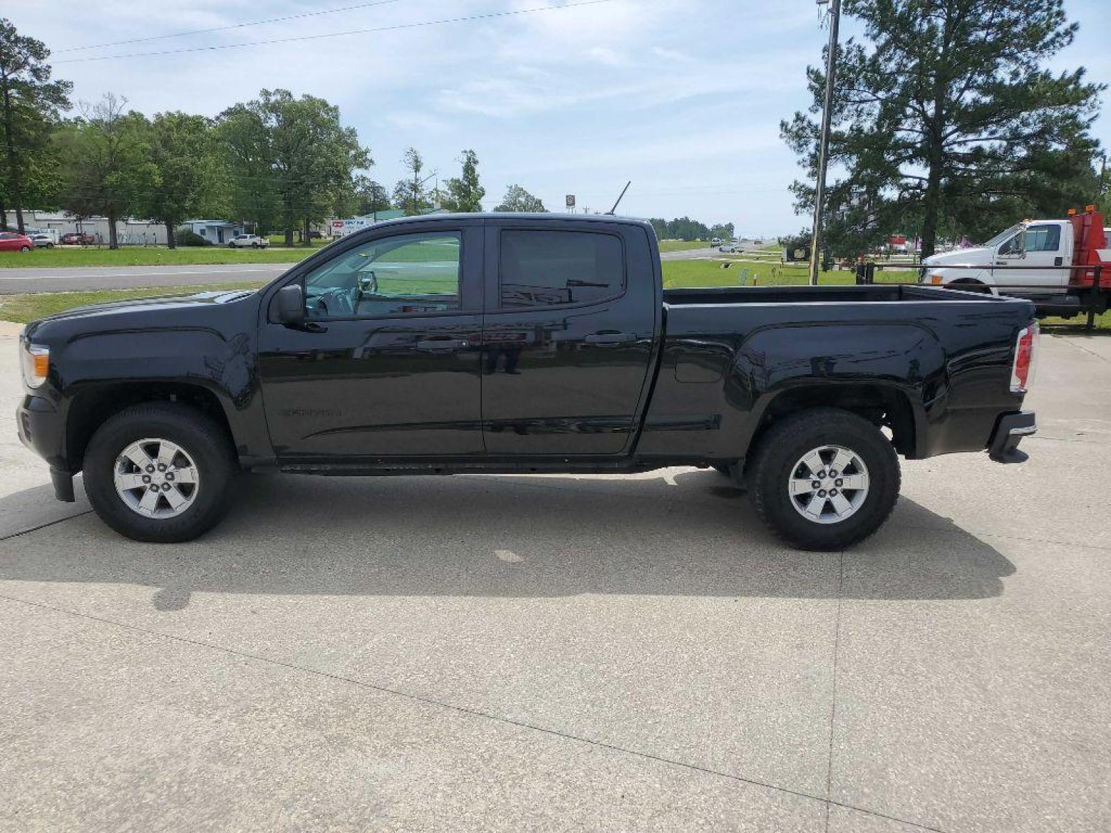 2018 Black GMC CANYON (1GTG5BEN7J1) with an 3.6L engine, Automatic transmission, located at 3553 US Hwy 190 W., Livingston, TX, 77351, (936) 967-8141, 30.812162, -95.077309 - Photo #1