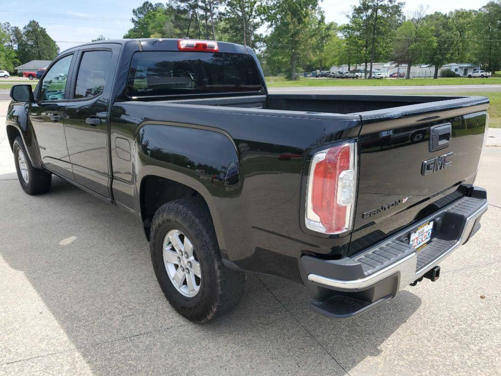 2018 Black GMC CANYON (1GTG5BEN7J1) with an 3.6L engine, Automatic transmission, located at 3553 US Hwy 190 W., Livingston, TX, 77351, (936) 967-8141, 30.812162, -95.077309 - Photo #2