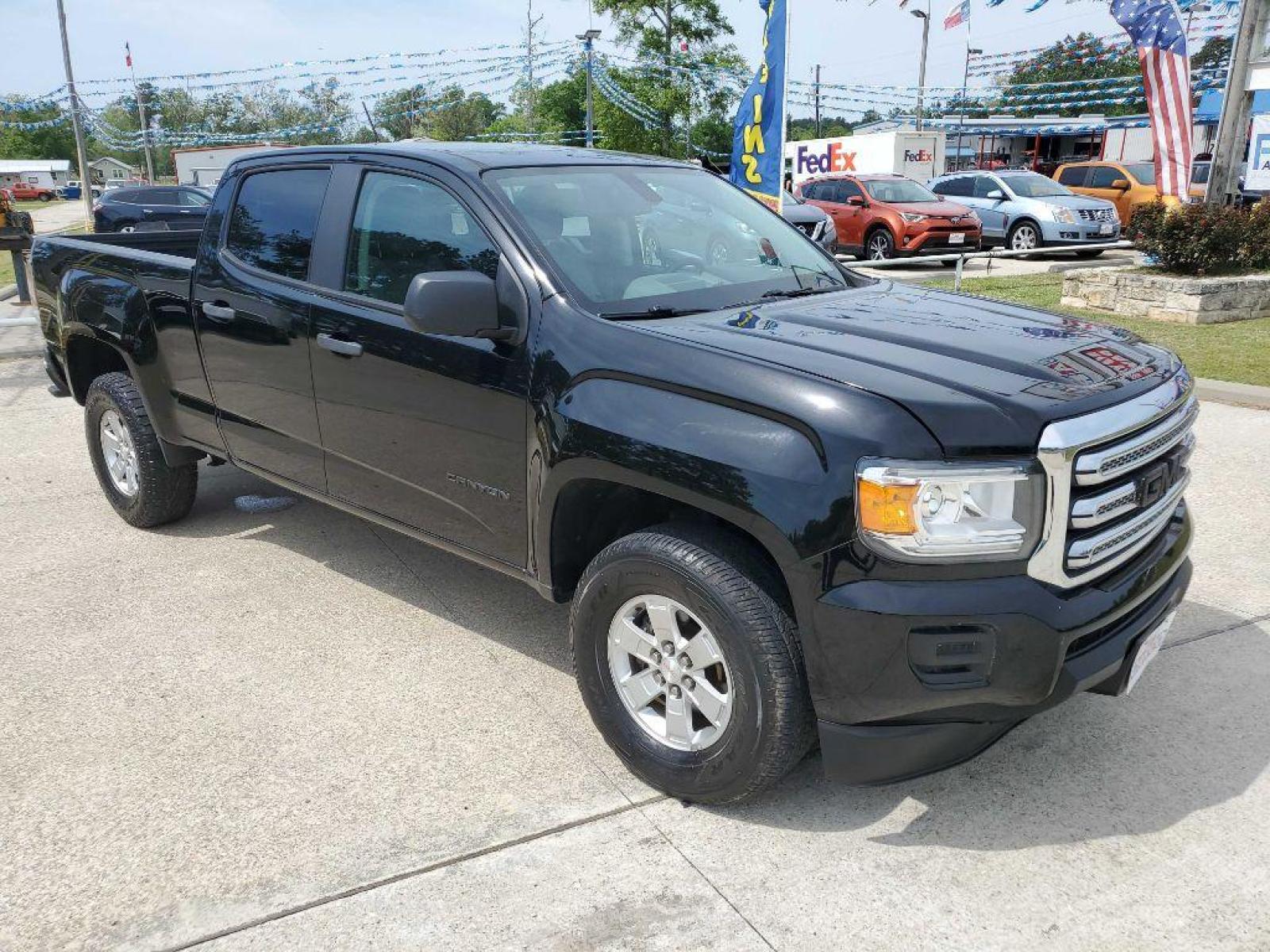 2018 Black GMC CANYON (1GTG5BEN7J1) with an 3.6L engine, Automatic transmission, located at 3553 US Hwy 190 W., Livingston, TX, 77351, (936) 967-8141, 30.812162, -95.077309 - Photo #6