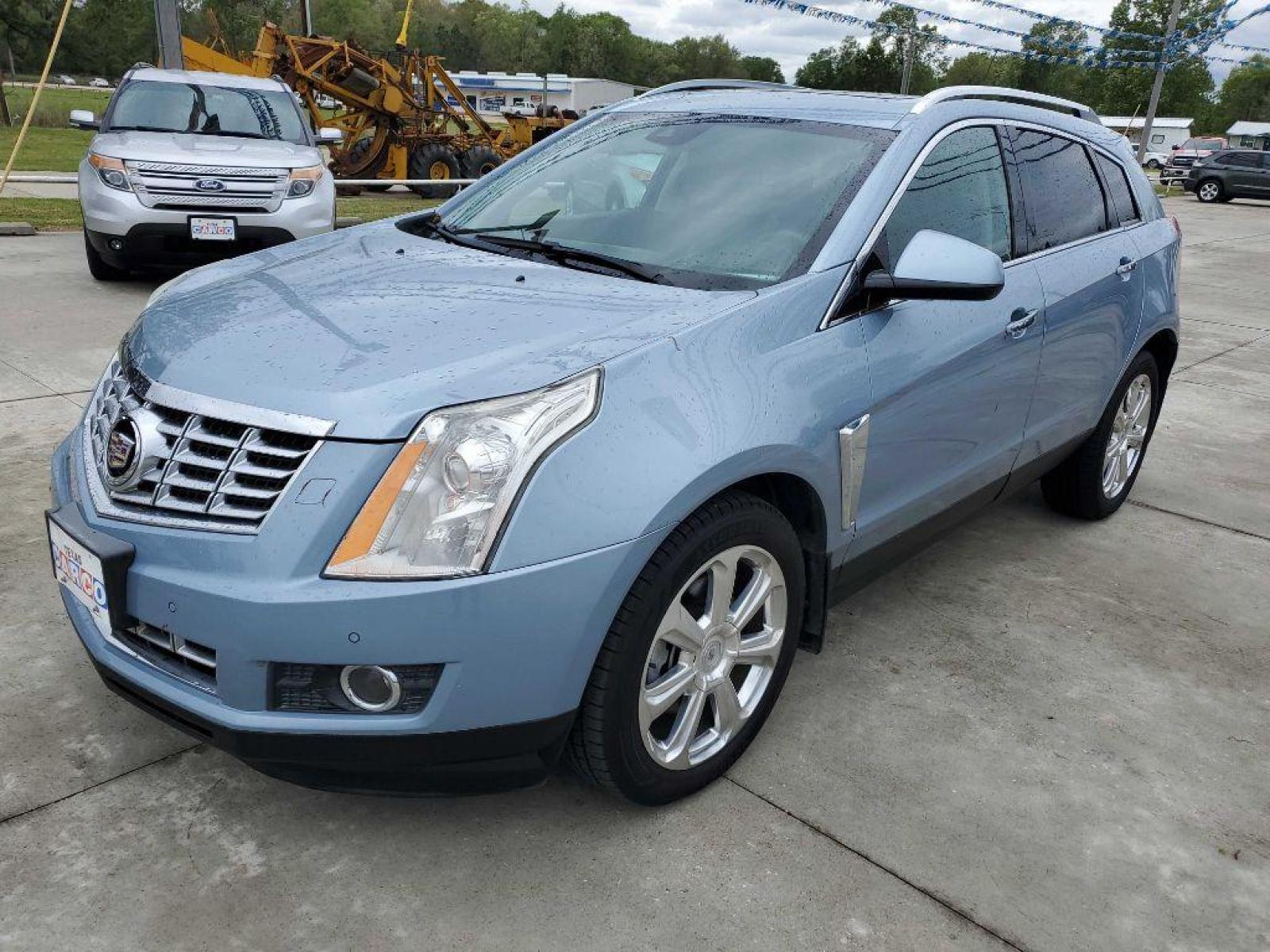 2013 Blue CADILLAC SRX PREMIUM COLLECTION (3GYFNEE38DS) with an 3.6L engine, Automatic transmission, located at 3553 US Hwy 190 W., Livingston, TX, 77351, (936) 967-8141, 30.812162, -95.077309 - 1 OWNER 2013 Cadillac SRX - Photo #0