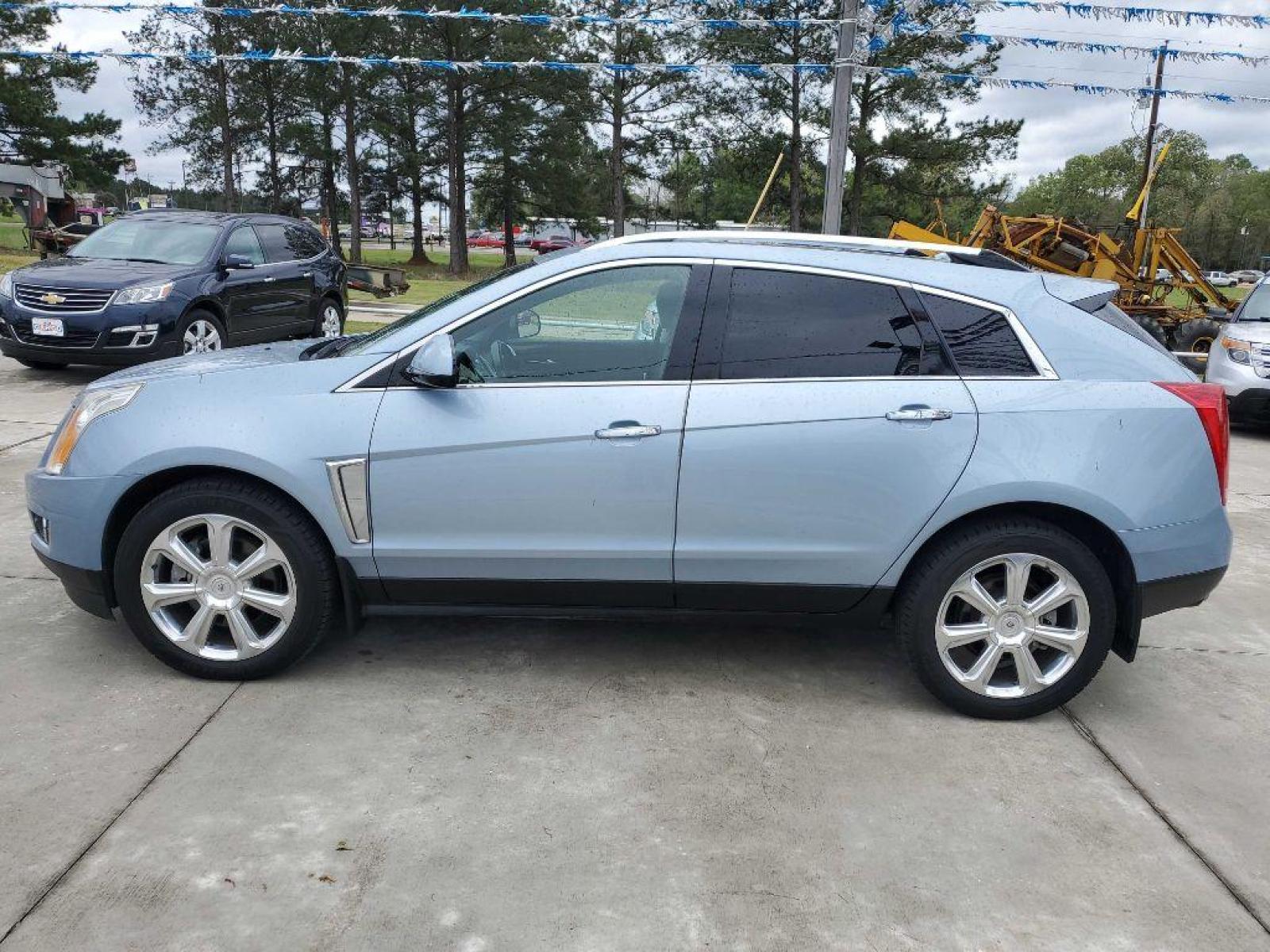 2013 Blue CADILLAC SRX PREMIUM COLLECTION (3GYFNEE38DS) with an 3.6L engine, Automatic transmission, located at 3553 US Hwy 190 W., Livingston, TX, 77351, (936) 967-8141, 30.812162, -95.077309 - 1 OWNER 2013 Cadillac SRX - Photo #1