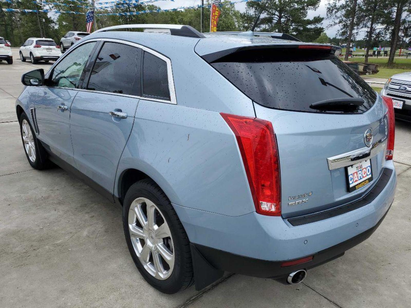 2013 Blue CADILLAC SRX PREMIUM COLLECTION (3GYFNEE38DS) with an 3.6L engine, Automatic transmission, located at 3553 US Hwy 190 W., Livingston, TX, 77351, (936) 967-8141, 30.812162, -95.077309 - 1 OWNER 2013 Cadillac SRX - Photo #2