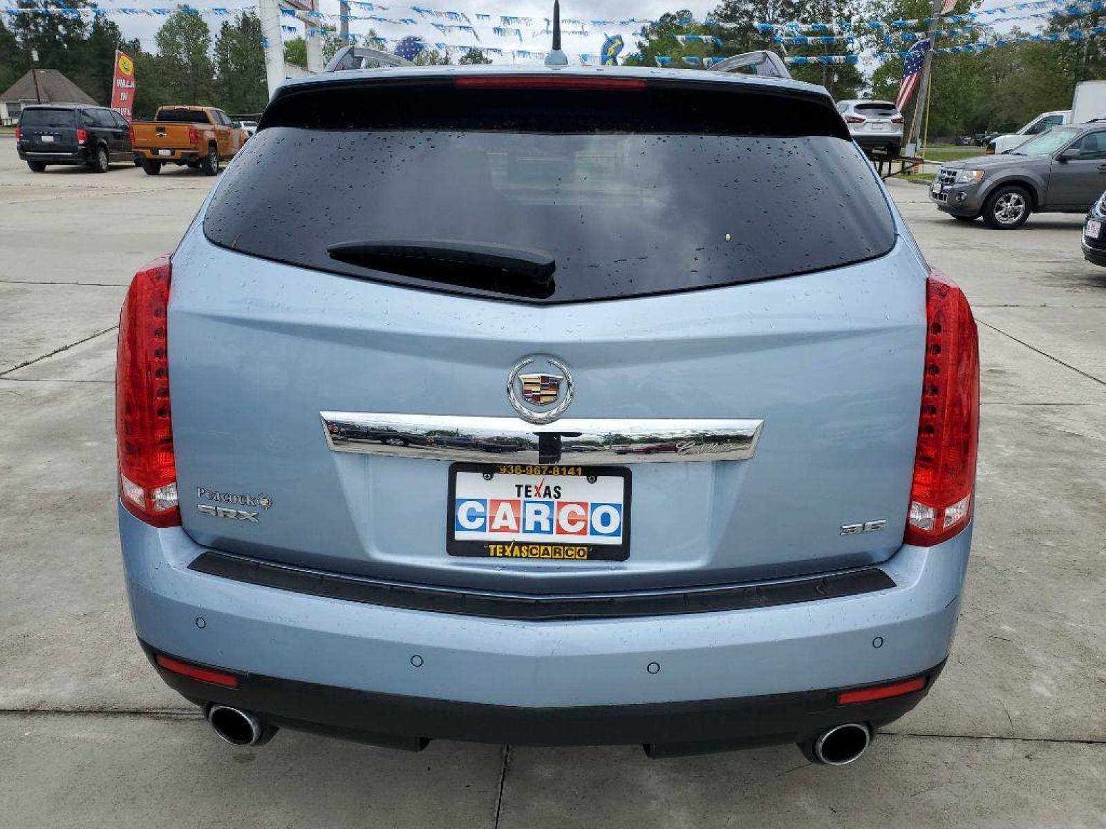 2013 Blue CADILLAC SRX PREMIUM COLLECTION (3GYFNEE38DS) with an 3.6L engine, Automatic transmission, located at 3553 US Hwy 190 W., Livingston, TX, 77351, (936) 967-8141, 30.812162, -95.077309 - 1 OWNER 2013 Cadillac SRX - Photo #3