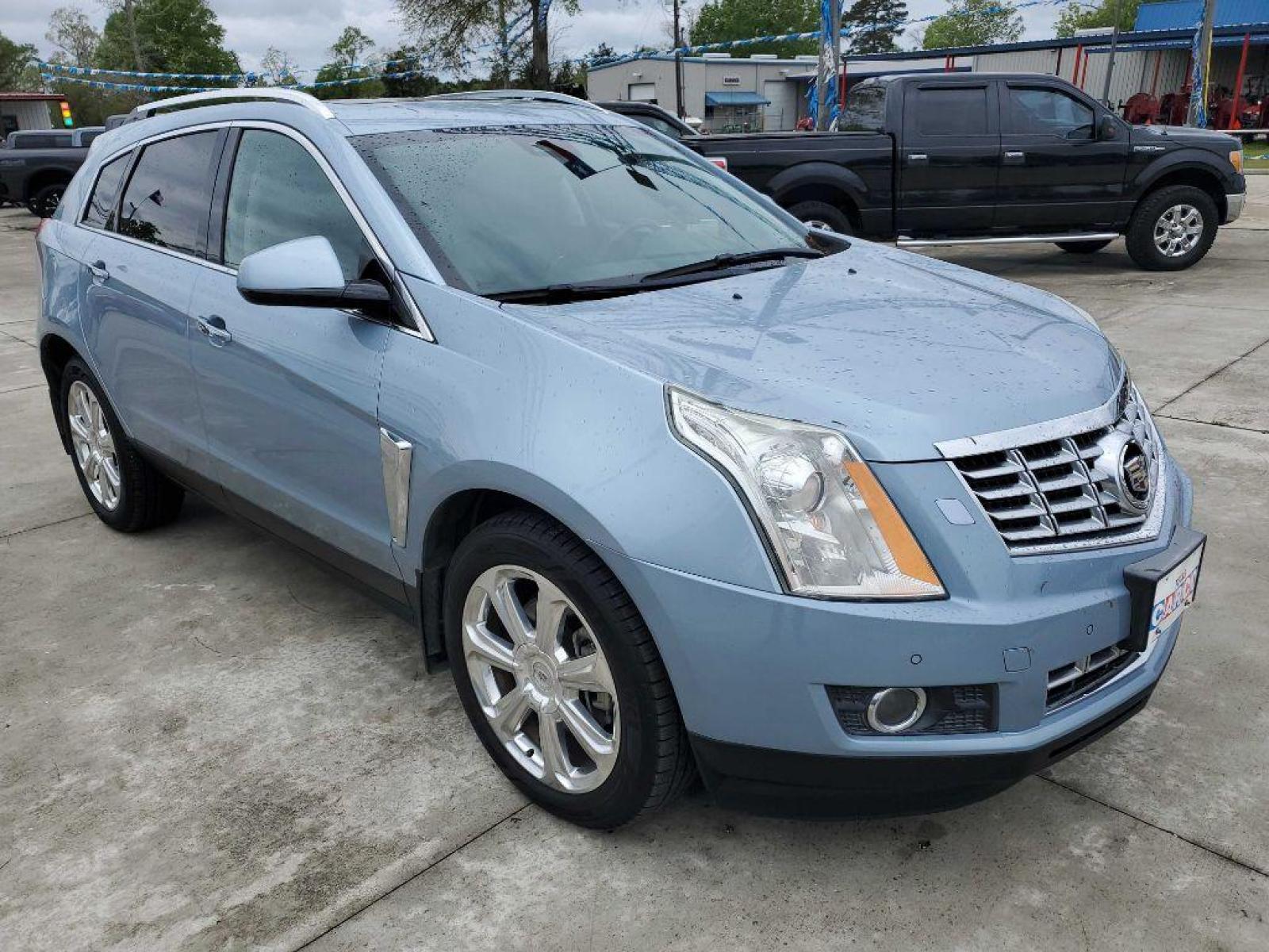 2013 Blue CADILLAC SRX PREMIUM COLLECTION (3GYFNEE38DS) with an 3.6L engine, Automatic transmission, located at 3553 US Hwy 190 W., Livingston, TX, 77351, (936) 967-8141, 30.812162, -95.077309 - 1 OWNER 2013 Cadillac SRX - Photo #6