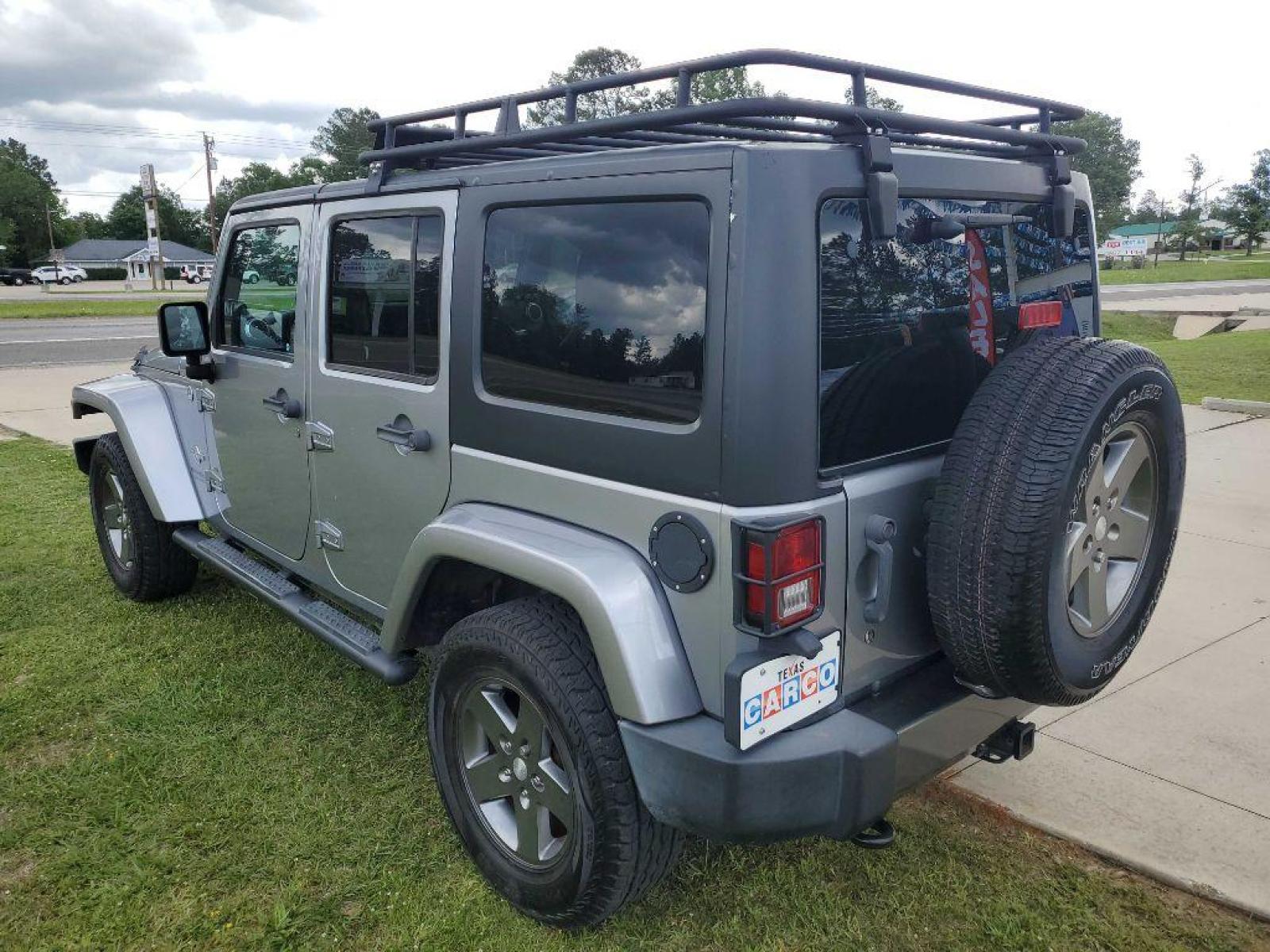 2013 Silver JEEP WRANGLER UNLIMI SPORT (1C4HJWDG8DL) with an 3.6L engine, Automatic transmission, located at 3553 US Hwy 190 W., Livingston, TX, 77351, (936) 967-8141, 30.812162, -95.077309 - Photo #2