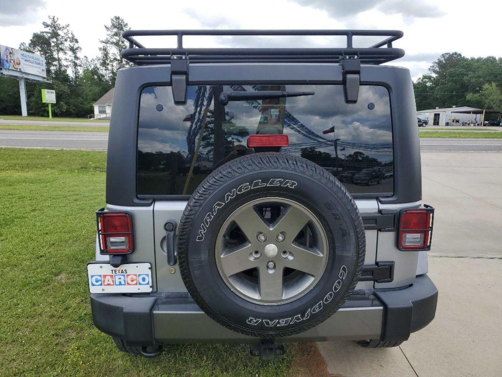 2013 Silver JEEP WRANGLER UNLIMI SPORT (1C4HJWDG8DL) with an 3.6L engine, Automatic transmission, located at 3553 US Hwy 190 W., Livingston, TX, 77351, (936) 967-8141, 30.812162, -95.077309 - Photo #3