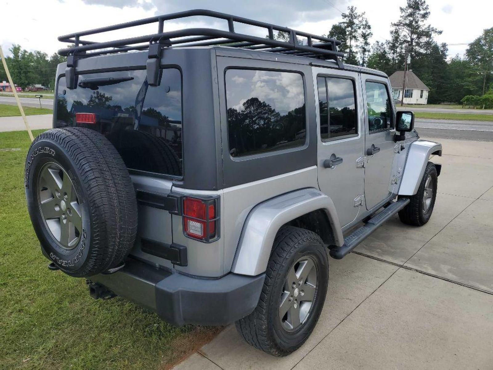 2013 Silver JEEP WRANGLER UNLIMI SPORT (1C4HJWDG8DL) with an 3.6L engine, Automatic transmission, located at 3553 US Hwy 190 W., Livingston, TX, 77351, (936) 967-8141, 30.812162, -95.077309 - Photo #4