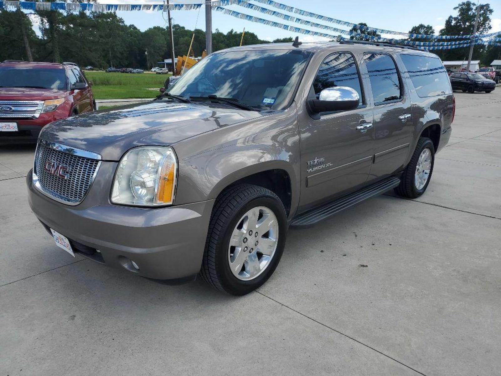 2013 Brown GMC YUKON XL 1500 SLT (1GKS1KE02DR) with an 5.3L engine, Automatic transmission, located at 3553 US Hwy 190 W., Livingston, TX, 77351, (936) 967-8141, 30.812162, -95.077309 - Photo #0