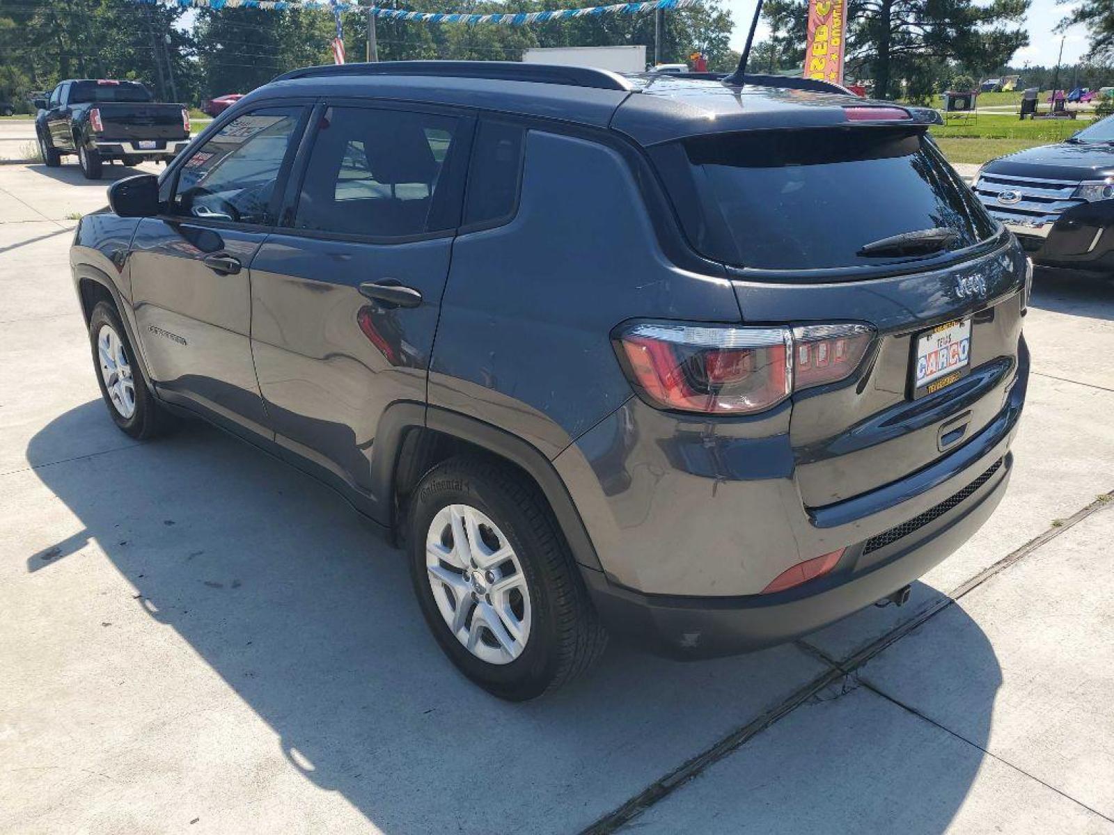 2018 Gray JEEP COMPASS SPORT (3C4NJCAB9JT) with an 2.4L engine, Automatic transmission, located at 3553 US Hwy 190 W., Livingston, TX, 77351, (936) 967-8141, 30.812162, -95.077309 - Photo #2
